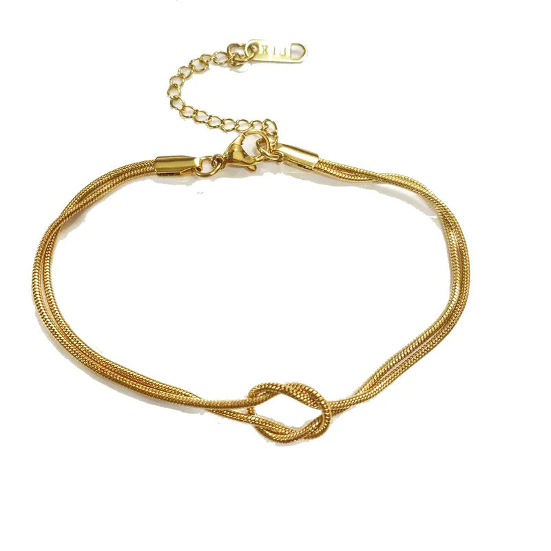 Armbånd med knude i 18 karat forgyldt titanium
