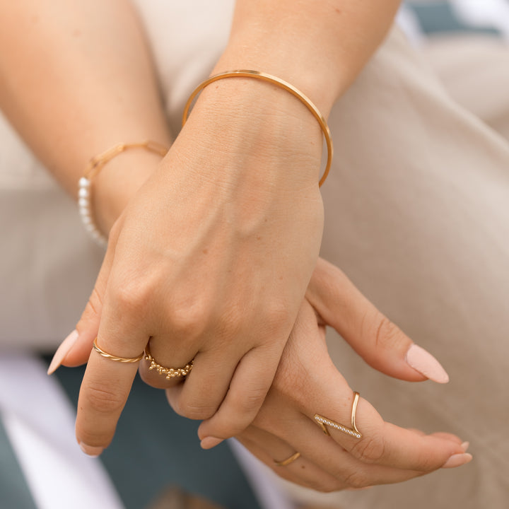 Smal bølge ring - 18 karat forgyldt titanium
