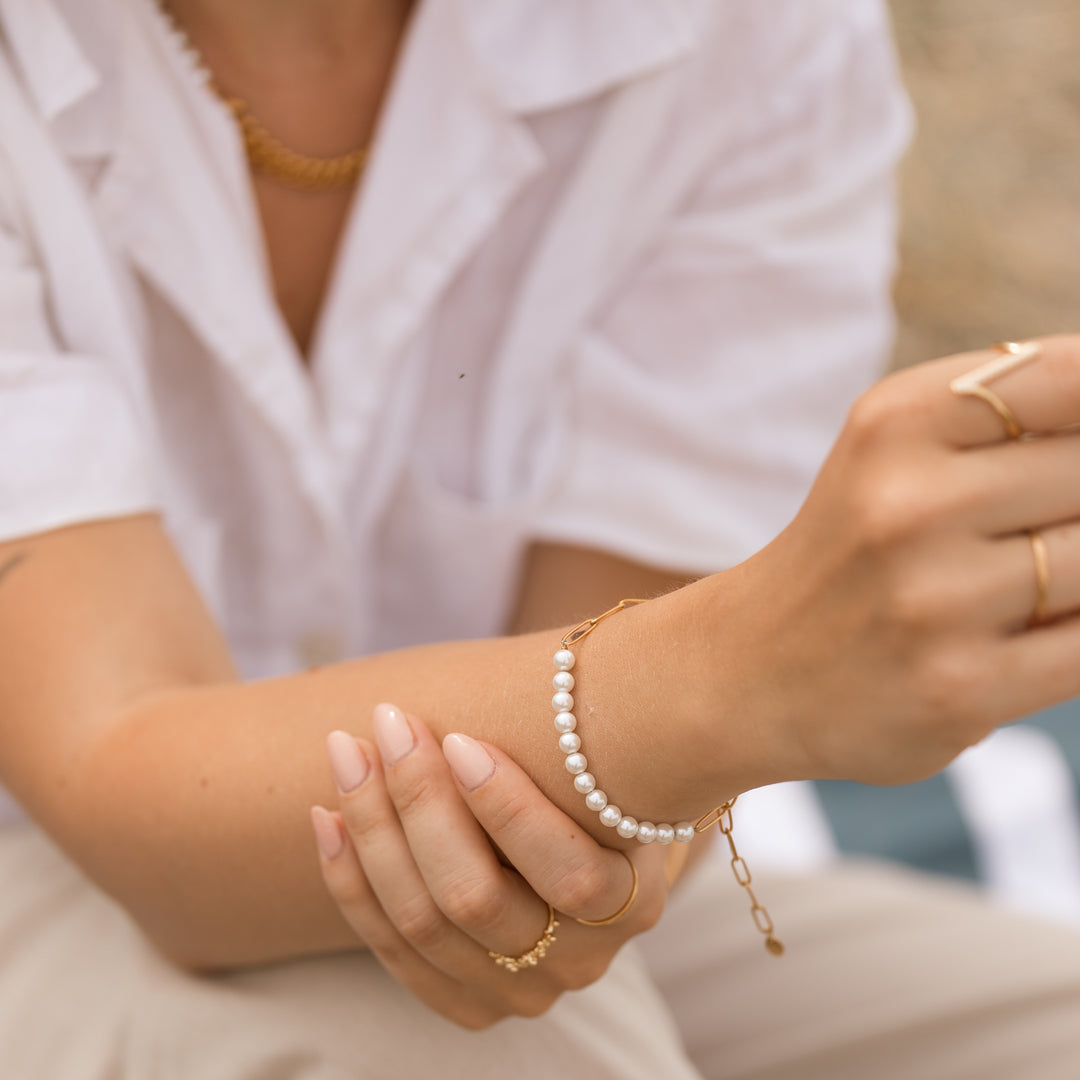 Link armbånd med perler i 18 karat forgyldt titanium