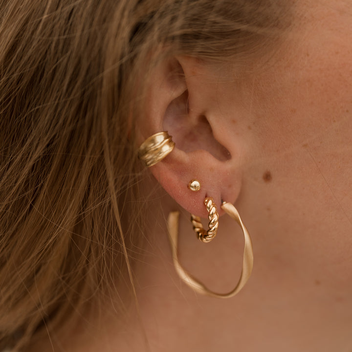 Snoede hoops i 18 karat forgyldt messing