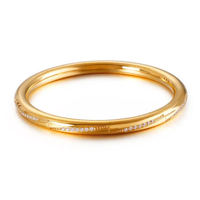 Bangle armring i 18 karat forgyldt titanium og zirkoner