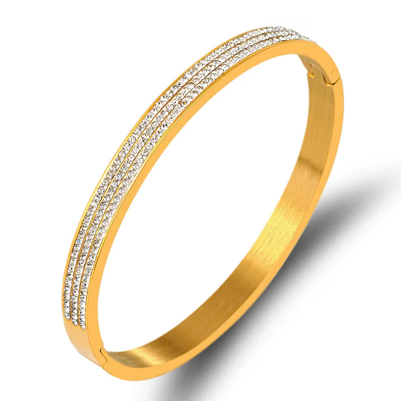 Bangle armring med zirkoner i 18 karat forgyldt titanium