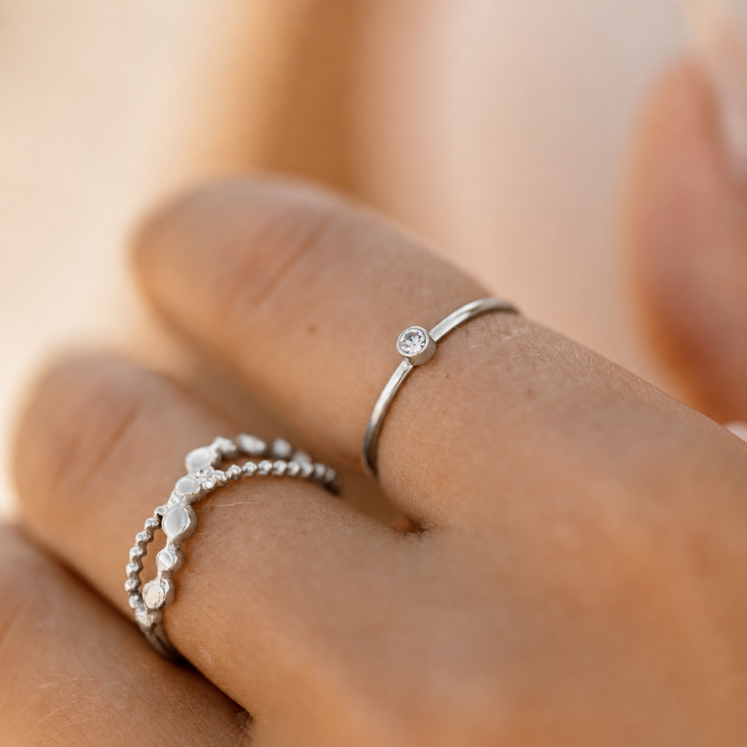 Boblet kryds ring - ædelstål