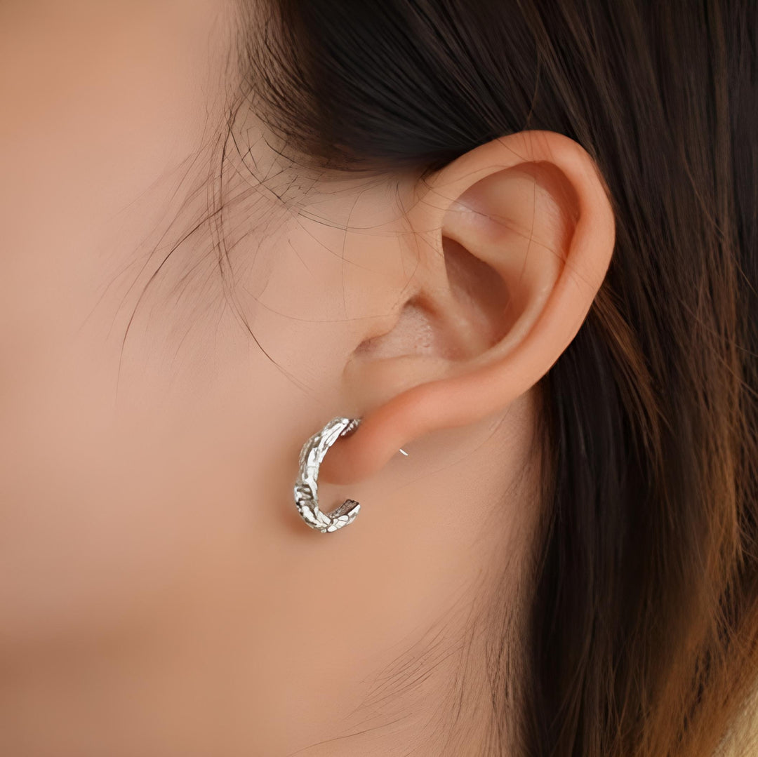 Hoops med smeltet struktur i titanium