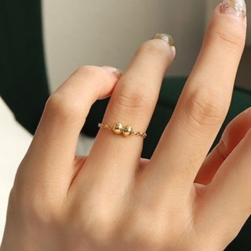 Kæde ringe med kugler i 18 karat forgyldt titanium